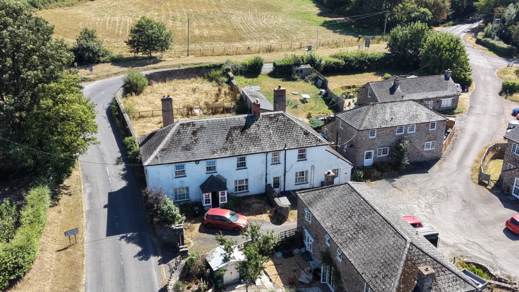 Lot: 222 - THREE-BEDROOM FARMHOUSE AND ATTACHED TWO-BEDROOM ANNEX - FREEHOLD INVESTMENT - Aerial view of Higher Grants Farmhouse and The Annex